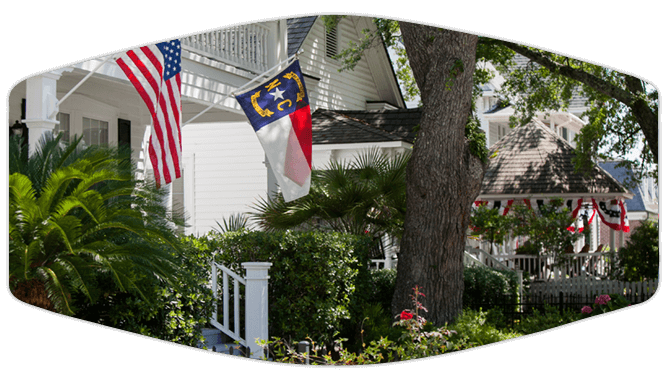 Houses with flag in front of the house