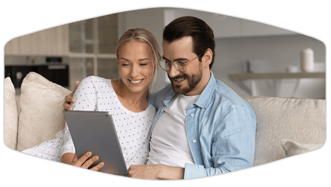 Couple looking at tablet 