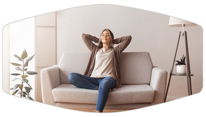 Woman sitting on the couch relaxing